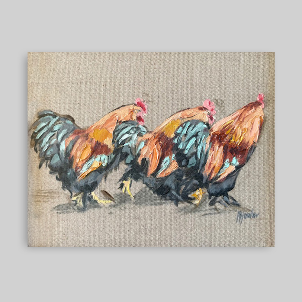 Orange and teal bantam cockerel walking